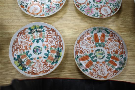 A near set of six 19th century Chinese famille rose saucer dishes, each painted with fruit and shou characters, diameter ranging 16.3cm